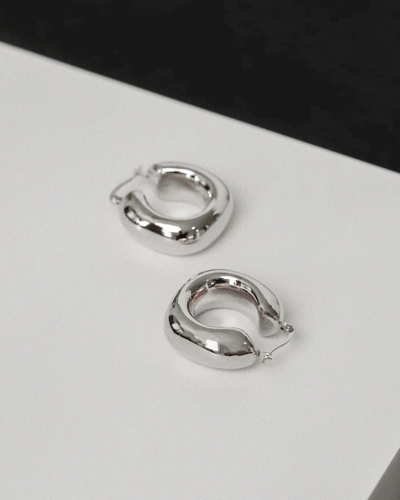 Oval Hollow Hoop Earrings - Silver